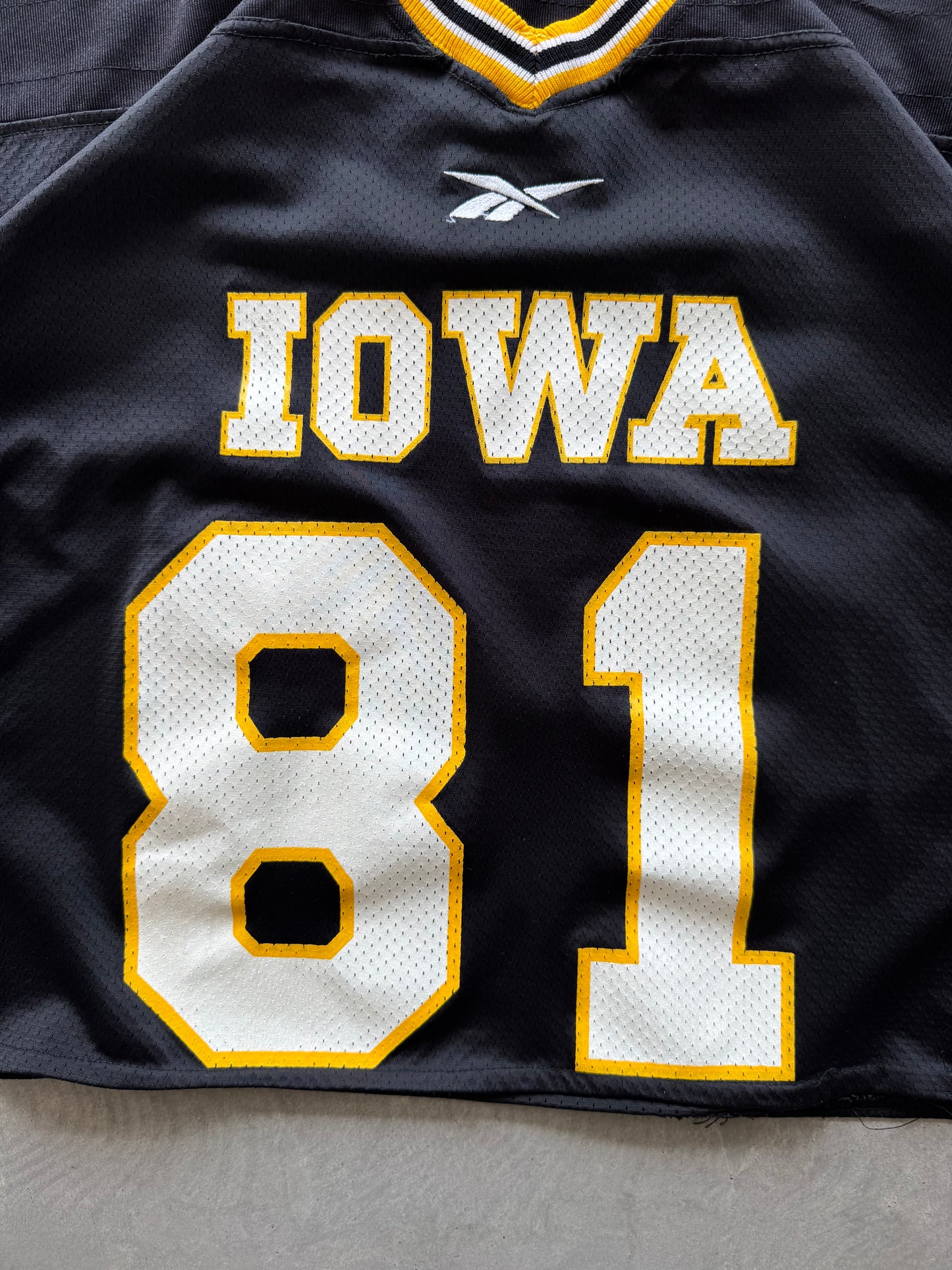 Vintage 90s Iowa Hawkeyes Cropped Reebok Jersey - XL