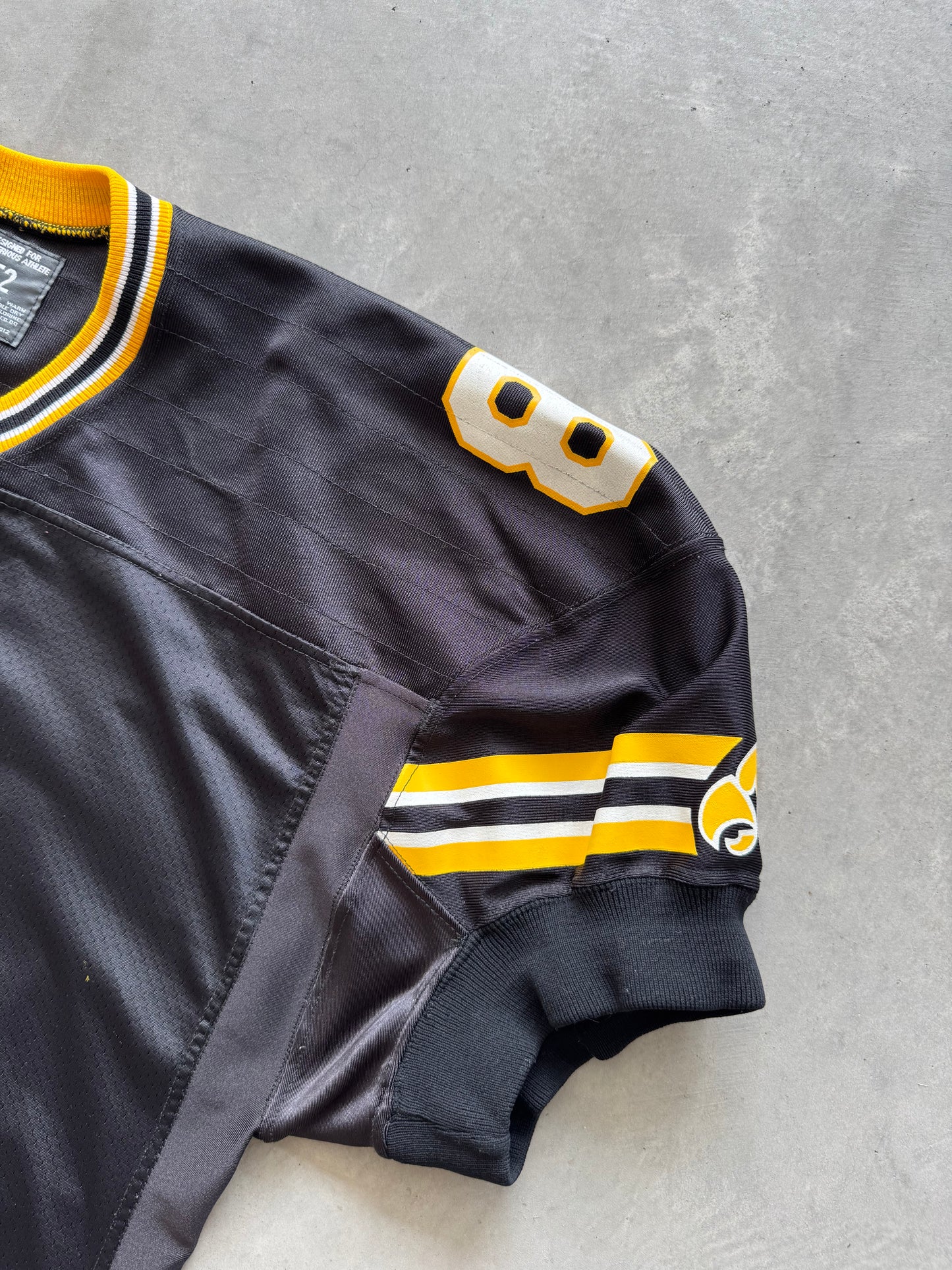 Vintage 90s Iowa Hawkeyes Cropped Reebok Jersey - XL