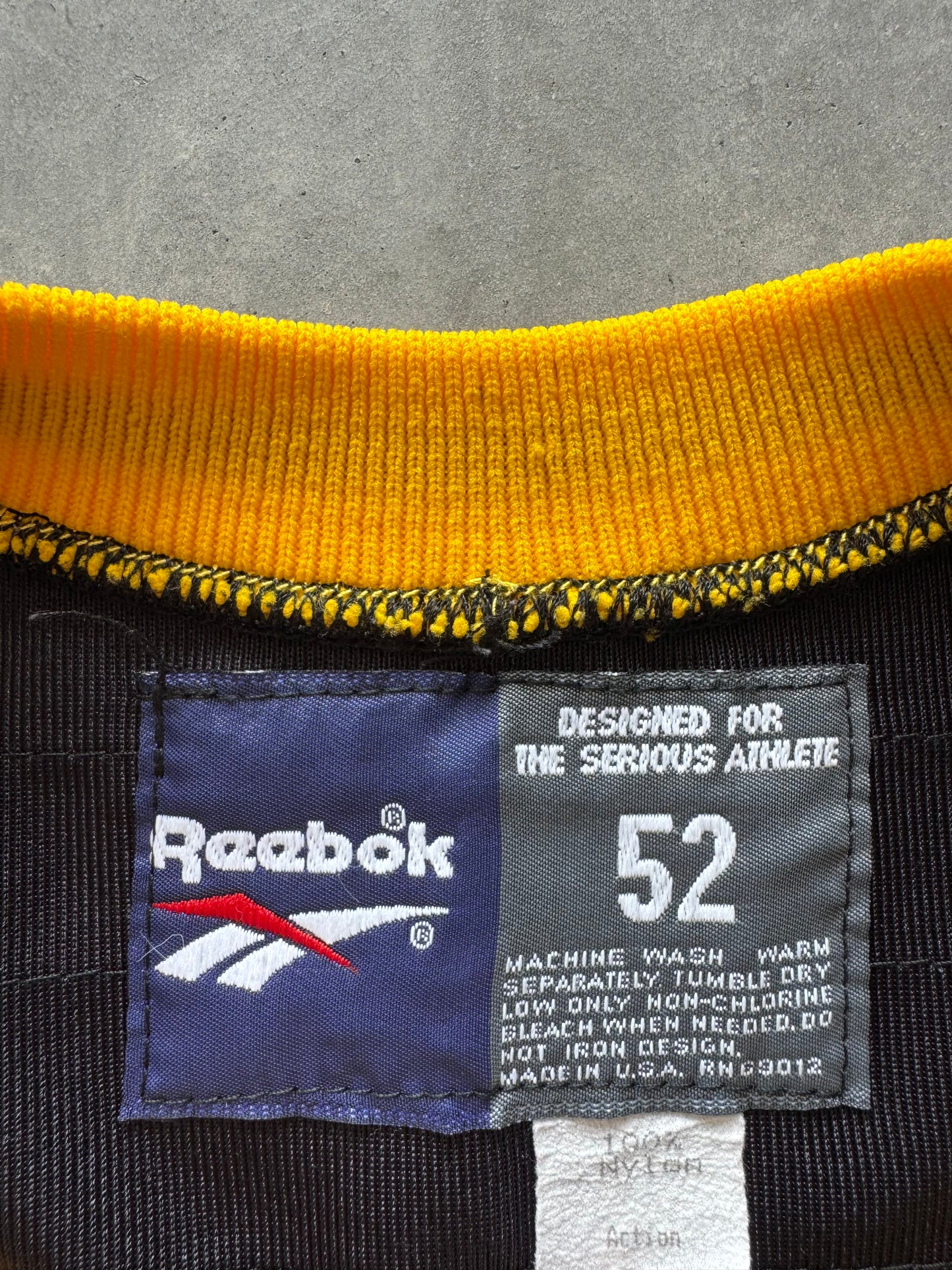 Vintage 90s Iowa Hawkeyes Cropped Reebok Jersey - XL